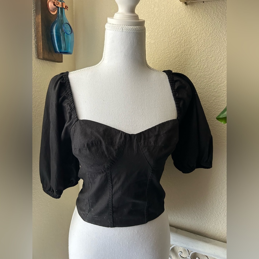 Gap black blouse. Never worn. Washed and now fits like a small.